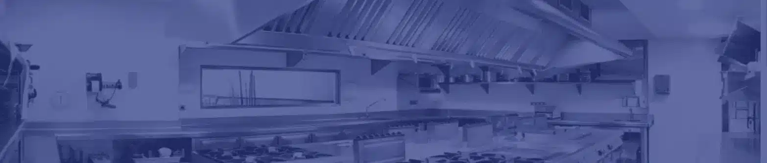Clean commercial kitchen with stainless steel exhaust hood system – One Stop Property Services
